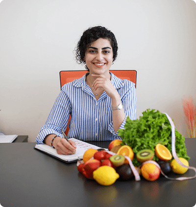 Nutritionist with fruits and vegetables